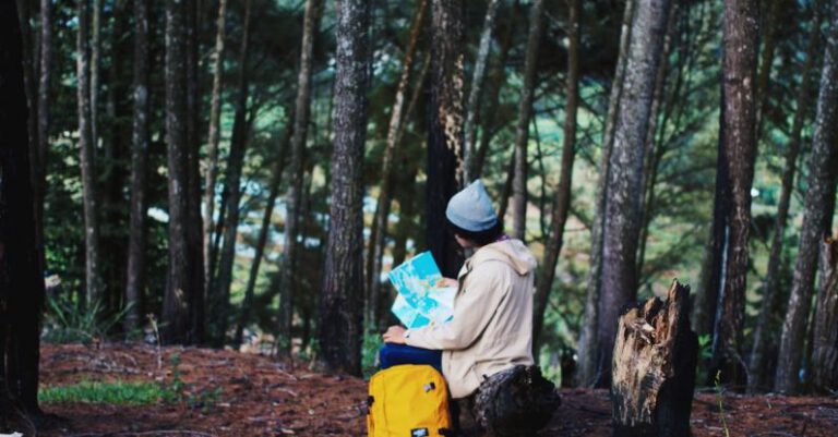 Trail Maps - Woman Wearing Blue Knit Cap