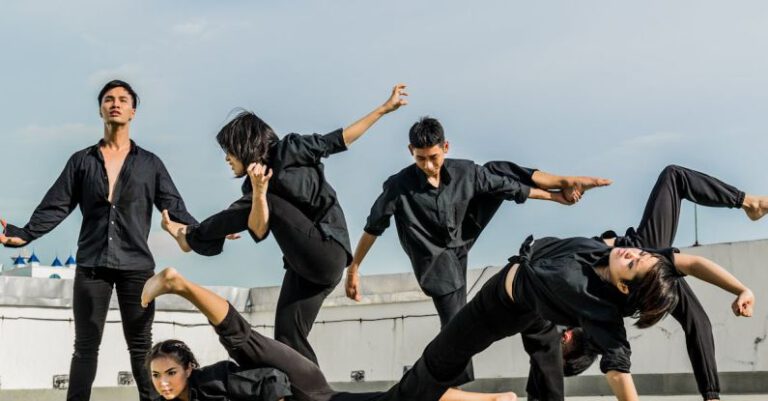 Flexibility - Persons in Black Shirt and Pants