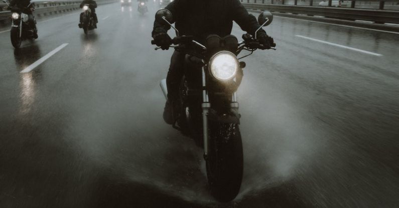 Group Riding - Riders Wearing Helmets Riding Their Motorcycles